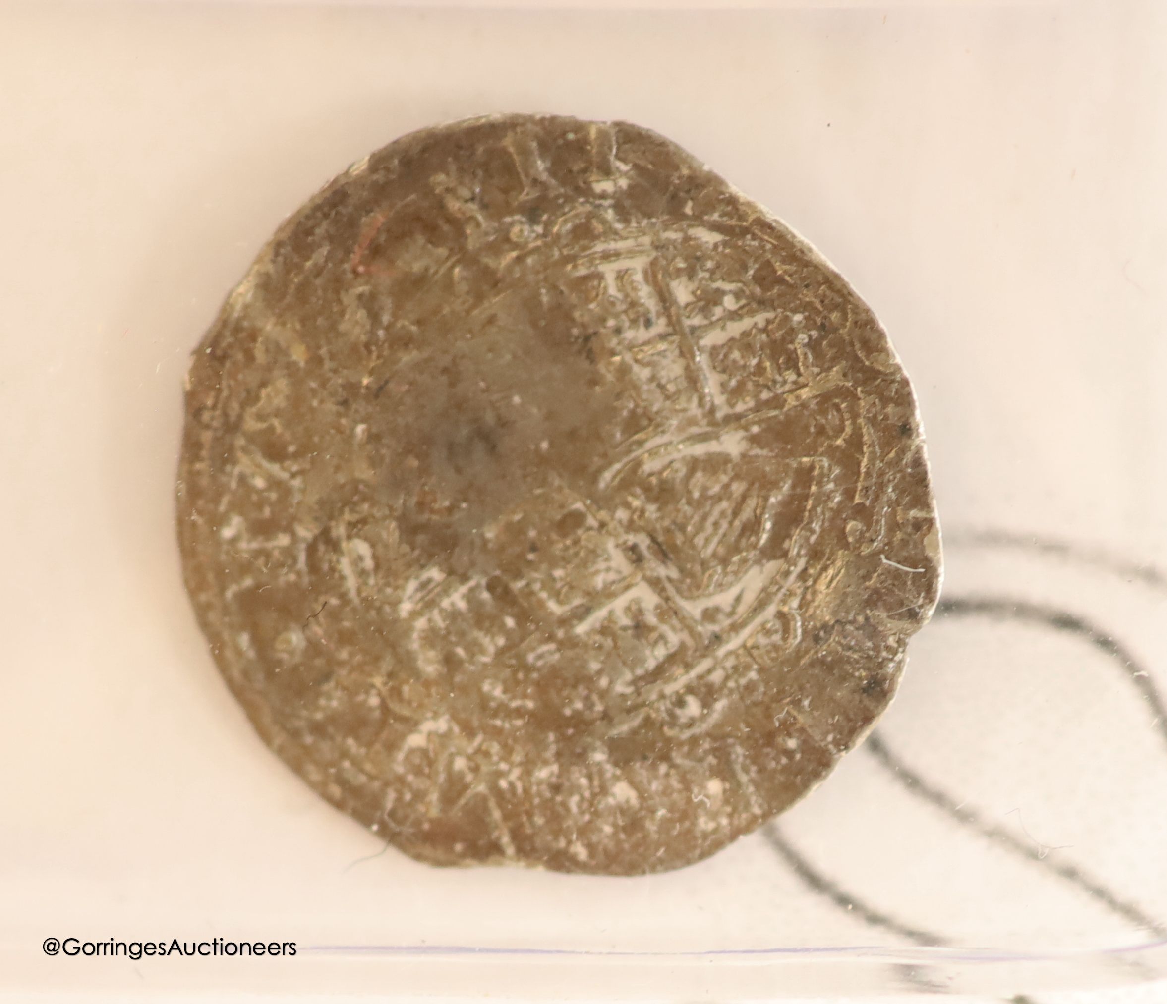An Edward I silver penny, and Edward III half groat and a Charles I silver penny